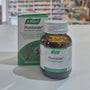 A bottle and packaging of A.Vogel Prostasan 90 capsules on a table.
