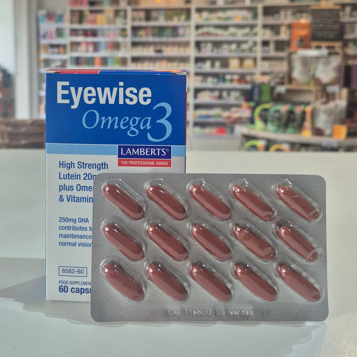 Eyewise Omega 3 supplement packaging with blurred store interior in the background