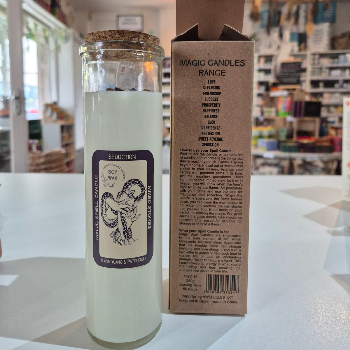 Bottle with a label and box on a white surface