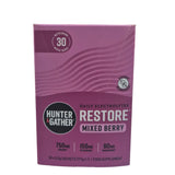 Purple package labeled 'Restore Mixed Berry' by 'Hunter & Gather' on a white surface with a white background.