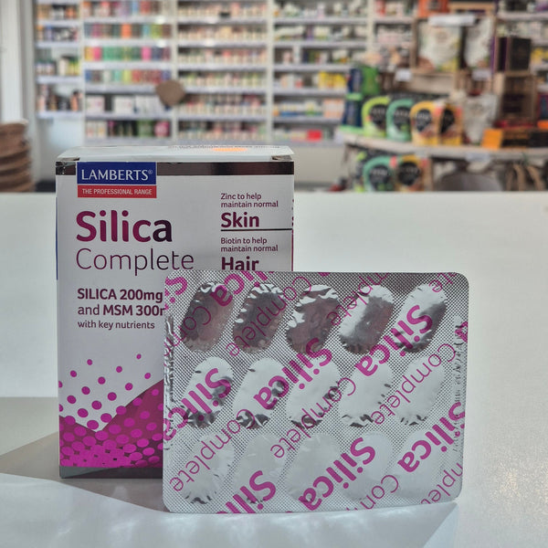 Silica supplement boxes in a store setting with shelves and products in the background