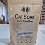 Oatmeal package with branding and product details on a white surface
