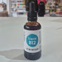 Bottle of Viridian Liquid B12 on a table with a blurred store background