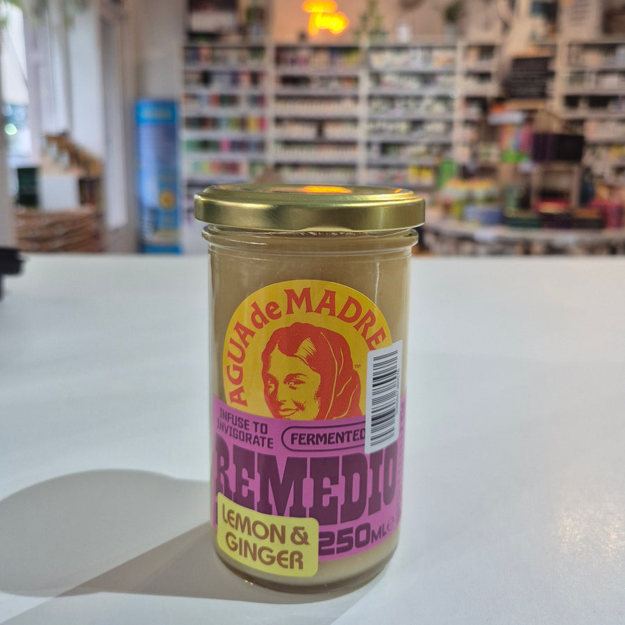 Can of Madre Lemon & Ginger drink with a blurred background