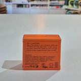 Orange box with text on a white surface