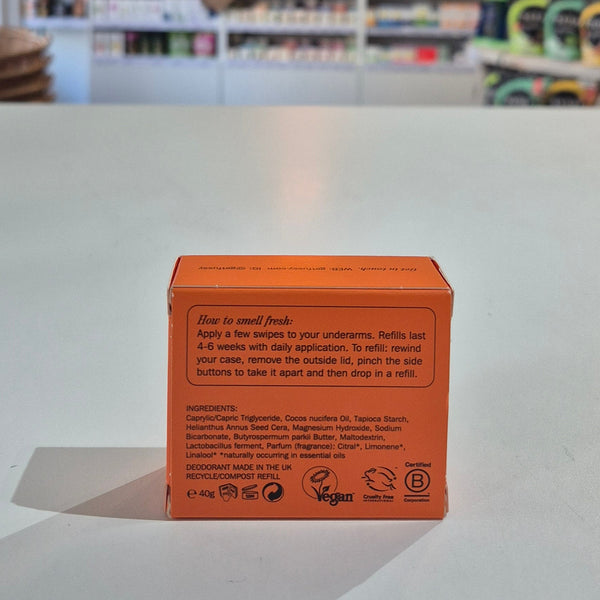 Orange box with text on a white surface