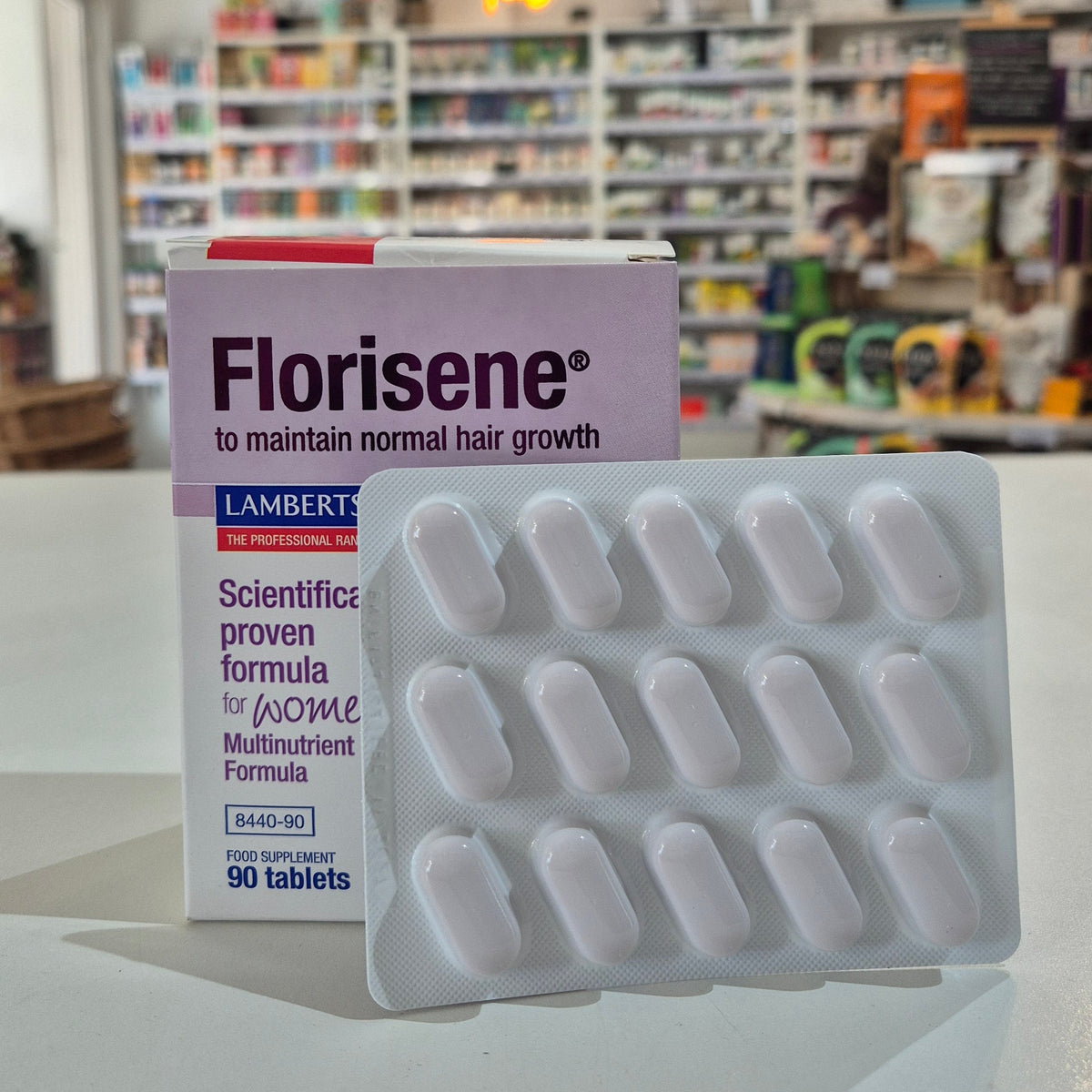 Florisene supplement packaging with tablets on a counter in a store setting