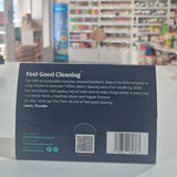 Product packaging with a barcode and text on a blurred background of books and shelves.