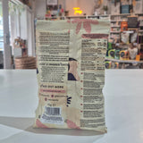 Product packaging with text and images on a white surface