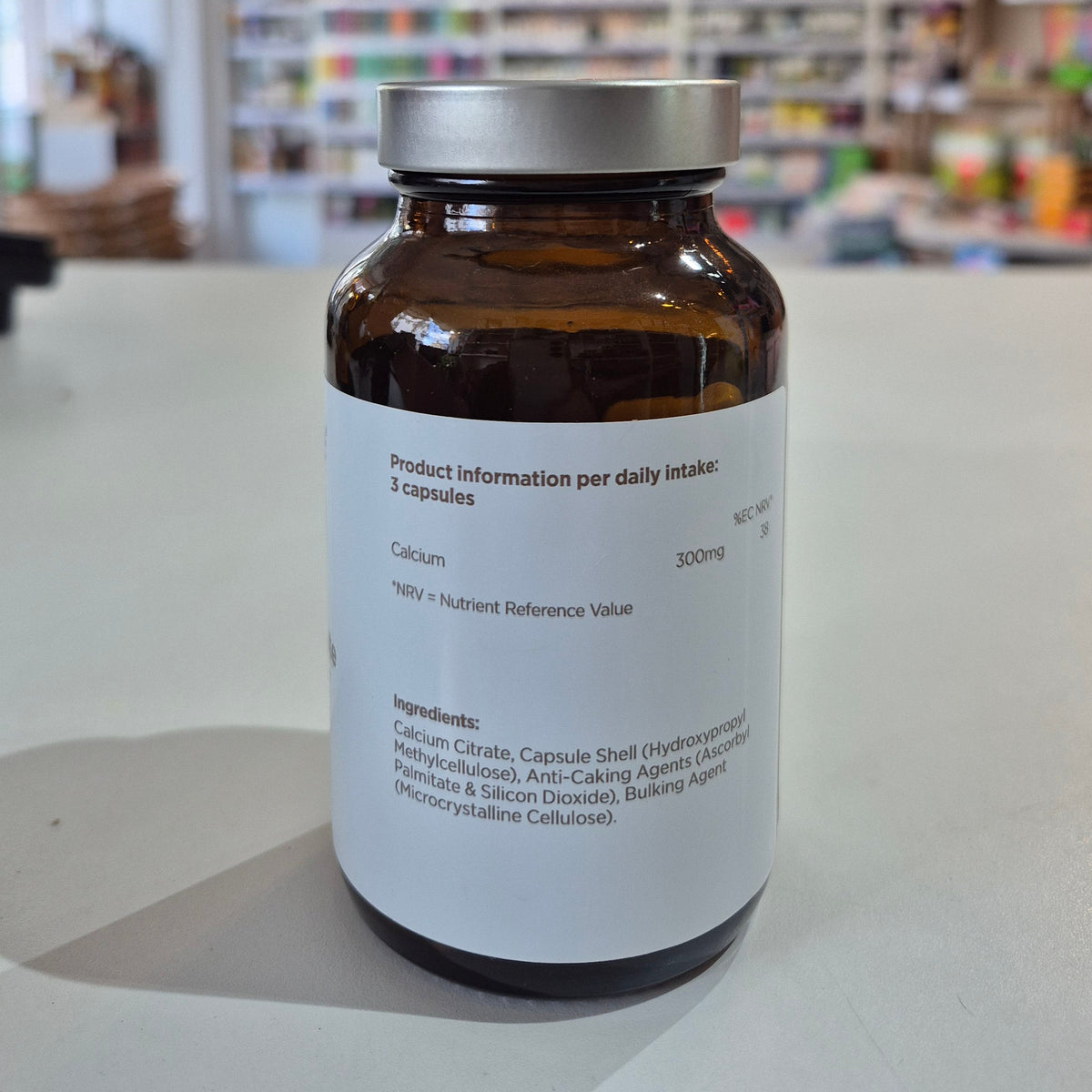 A bottle of Biocare Calcium Citrate containing 90 capsules for bone and muscle support. side of the jar