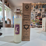 Candle with packaging labeled 'Magic Spell Candle for Love' in a store setting