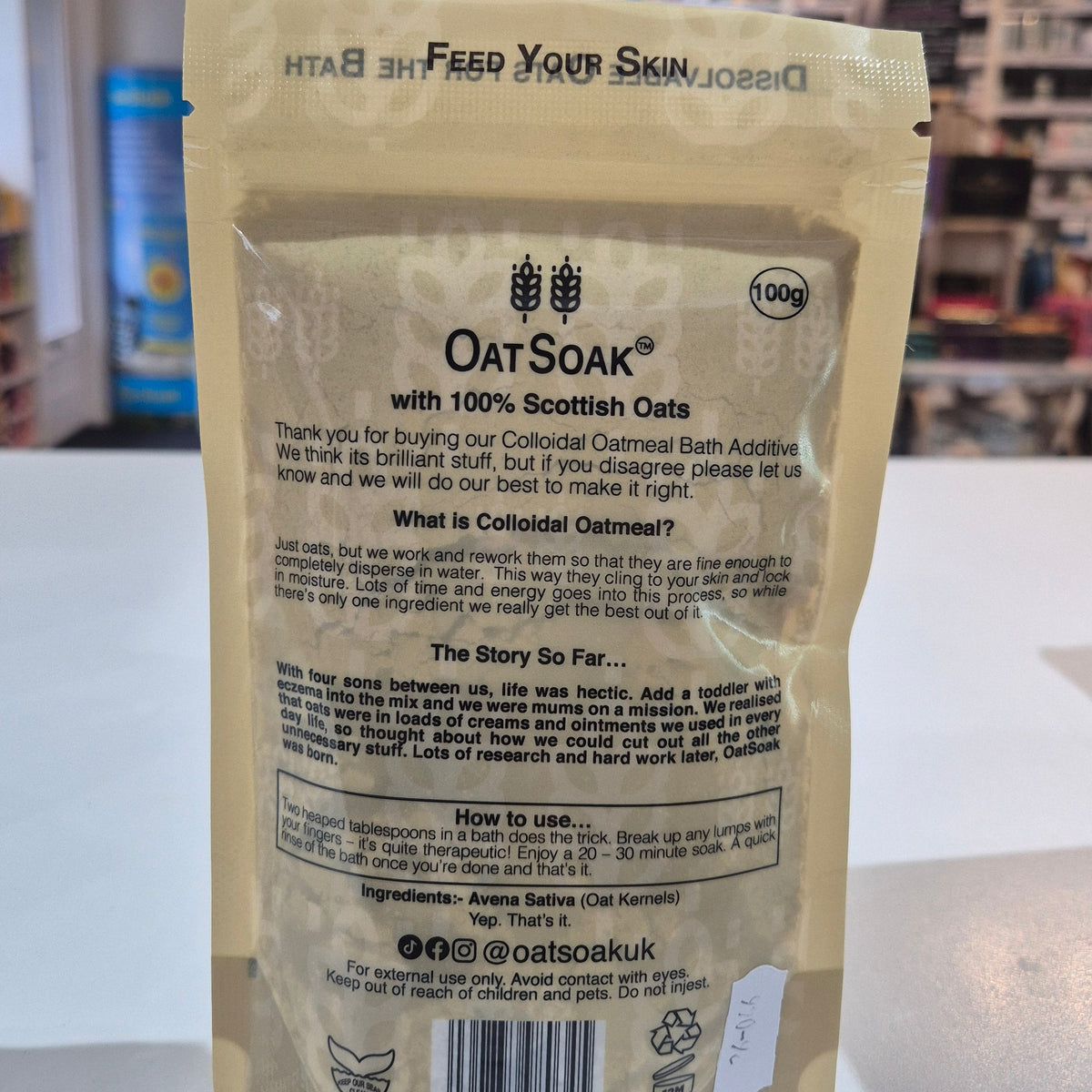 Package of OatSoak with visible text and barcode on a blurred indoor background