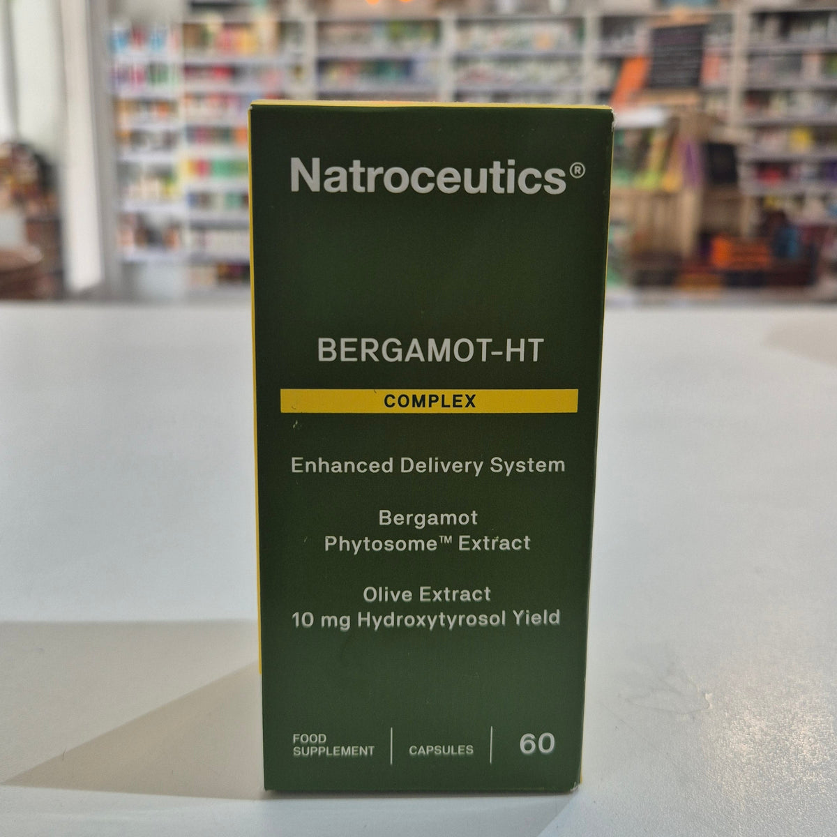 Natroceuticals Bergamot-HT Complex supplement box on a table with a blurred background