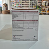 Box with nutritional information on a white surface, blurred store background