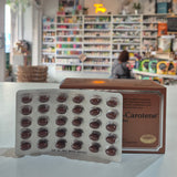 Pharmanord Supplement packaging with 'Carotene' on a counter in a store setting