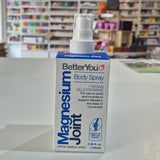 BetterYou Magnesium Joint Body Spray bottle on a surface with a blurred store background