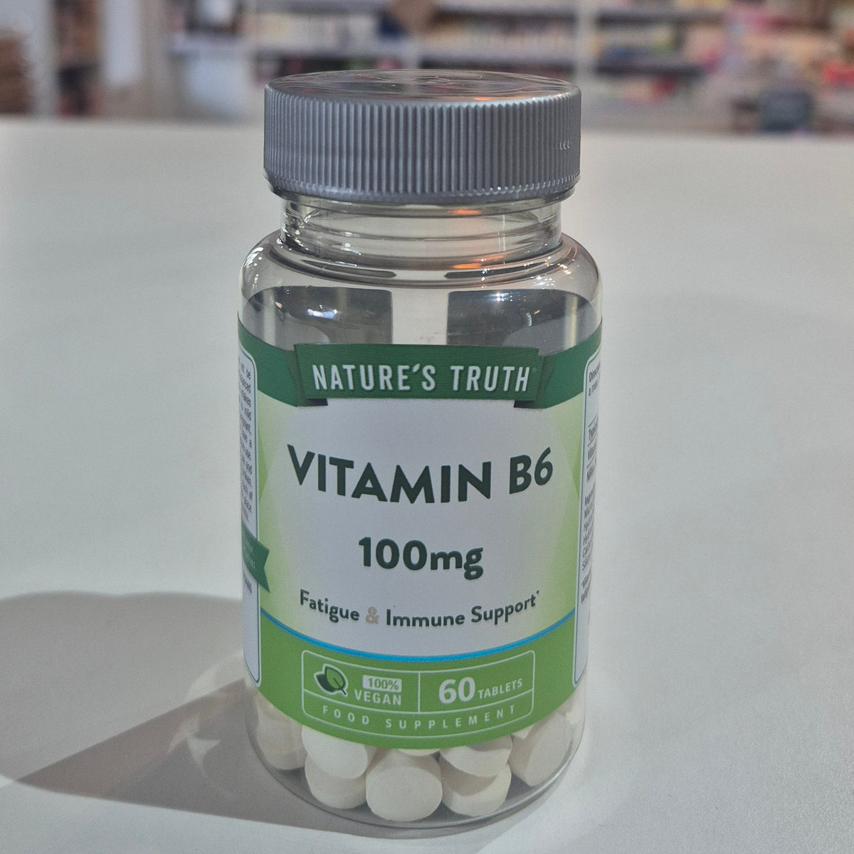 Bottle of Nature's Truth Vitamin B6 100mg on a white surface