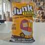 Junk Food Organic Vegetable Crisps packaging on a white surface with a blurred background