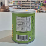 Green can with nutritional information label on a white surface