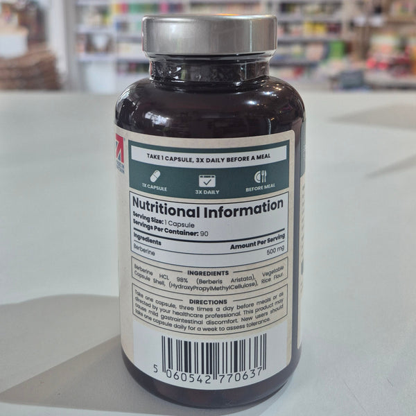 Supplement bottle with label showing nutritional information on a store shelf background
