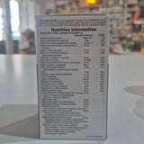 Nutrition information label on a supplement package with a blurred background