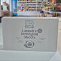 Box of Simple Living eco laundry detergent sheets in a store setting