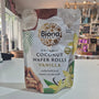 Biona Organic Coconut Wafer Rolls Vanilla package on a table with a store background