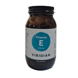 Vitamins E supplement bottle with 'Viridian' label on a white background