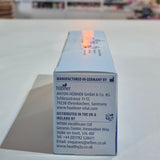 Box of silicea Gastrointestinal Direct on a counter with a blurred store background. Product packaging with branding and contact information on a blurred background