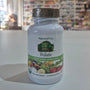 NaturesPlus Folate supplement bottle on a counter with a blurred store background