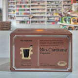 Box of Bio-Carotene Capsules on a counter with a store shelf in the background