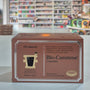 Box of Bio-Carotene Capsules on a counter with a store shelf in the background