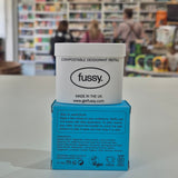 Fussy compostable deodorant refill packaging with a store in the background