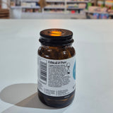 Bottle cap with visible label against a blurred indoor background