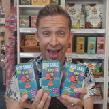 Person holding Bob Snail products in a store setting