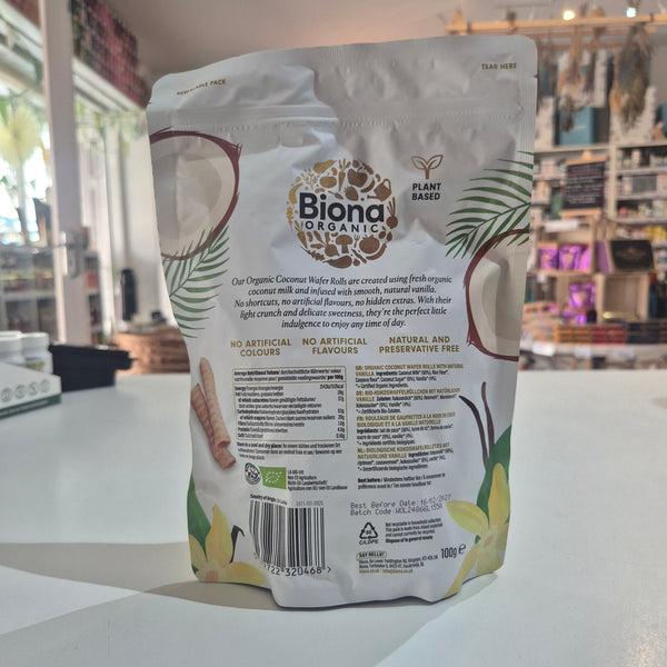 Biona organic coconut water packaging on a white surface with a blurred indoor background
