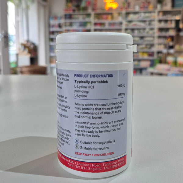 Close-up of a bottle with a label in an indoor setting, possibly a store.
