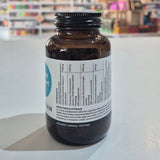 Brown supplement bottle with label on a white surface