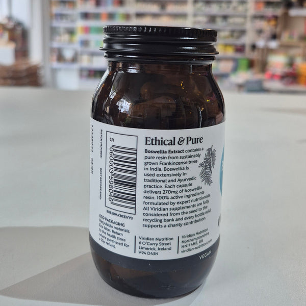 Bottle of Boswellia extract by Viridian on a white surface with a blurred background