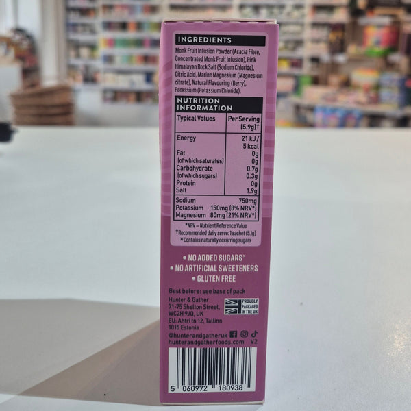 Close-up of a purple product label with a blurred store interior in the background