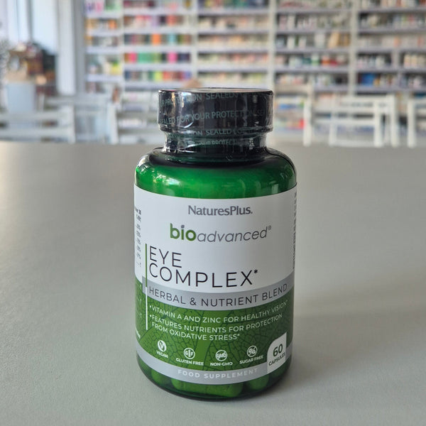 NaturesPlus bioadvanced Eye Complex bottle on a table with a blurred background