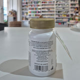 Close-up of a bottle with a blurred indoor setting in the background