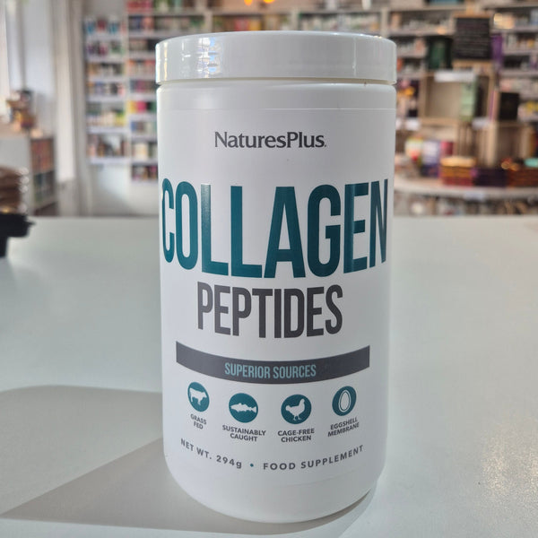 NaturesPlus Collagen Peptides container on a counter with a store background