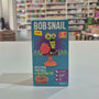 Bob Snail toy packaging with colorful design on a shelf background