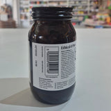 Bottle of Viridian Extra C supplement on a white surface with a blurred background