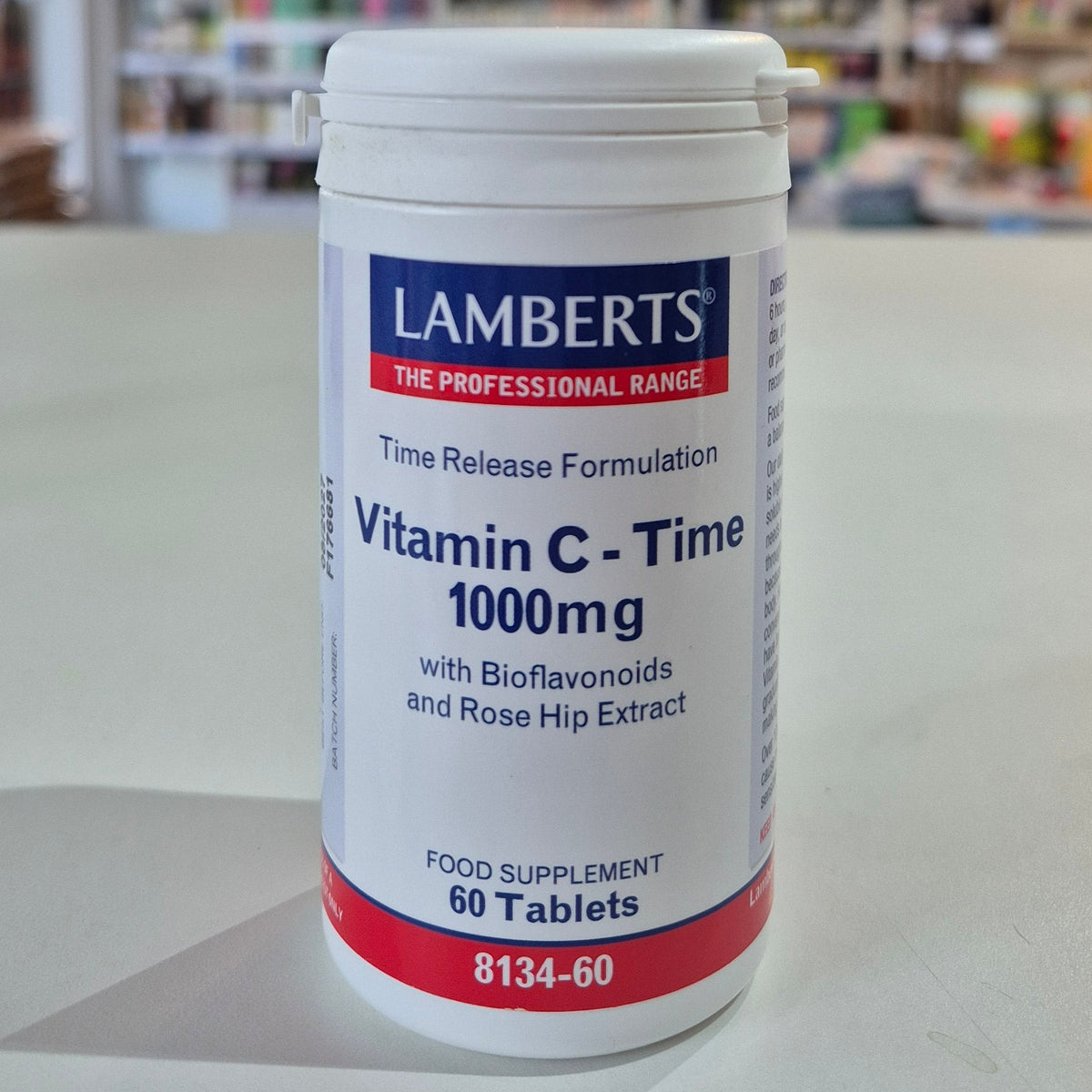 Lamberts Vitamin C-Time 1000mg supplement container on a table