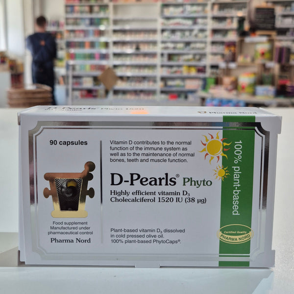 Box of D-Pearls Phyto vitamin supplement on a shelf in a pharmacy.
