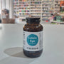 Bottle of Viridian Lutein Eye Complex on a counter with a blurred store background