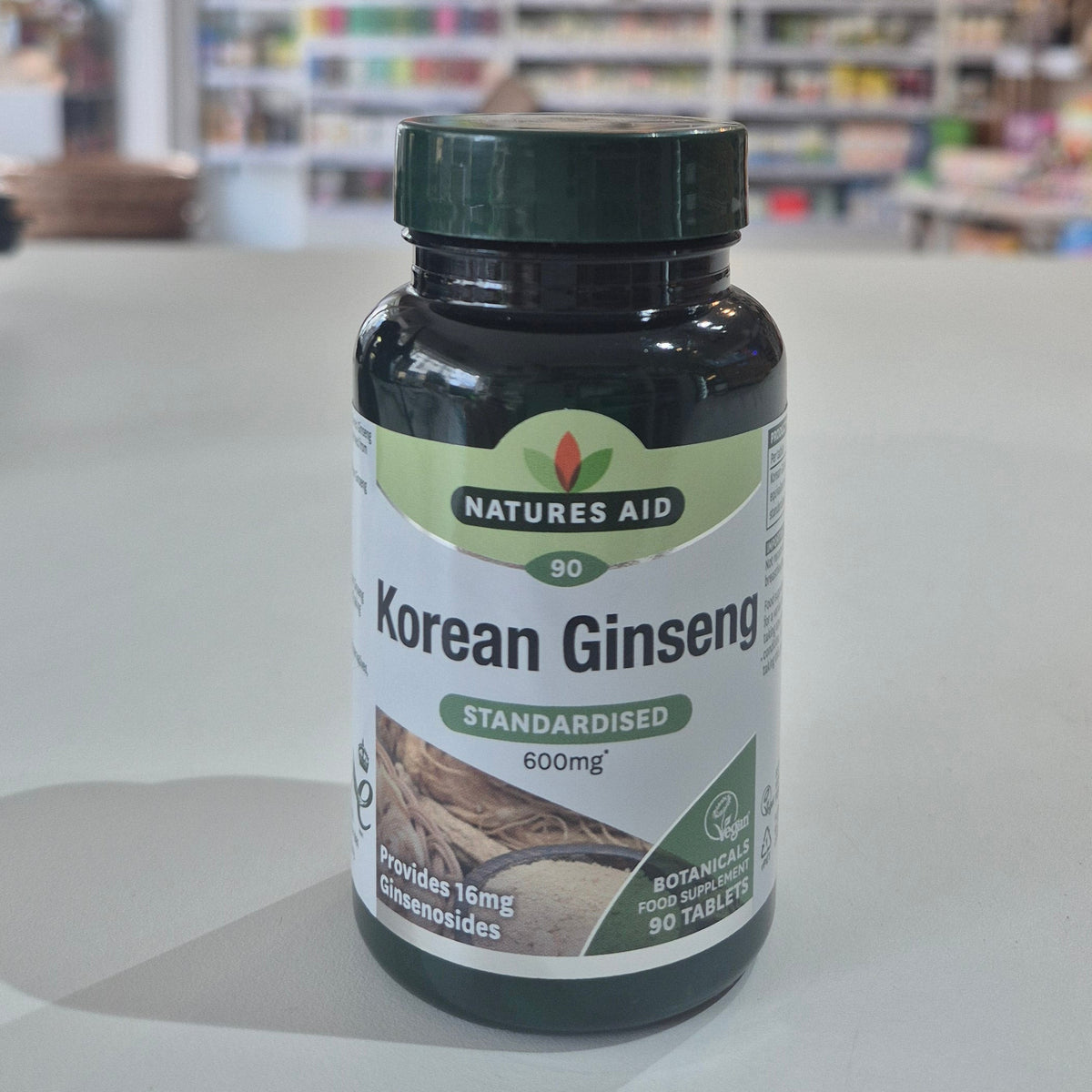 Bottle of Korean Ginseng on a shelf with a blurred store background