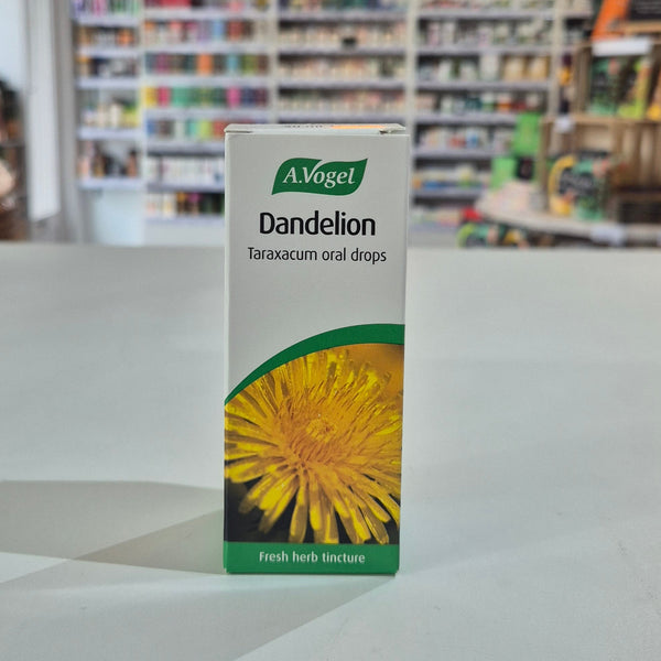 A box of A.Vogel Dandelion Taraxacum oral drops on a surface with a blurred store background.